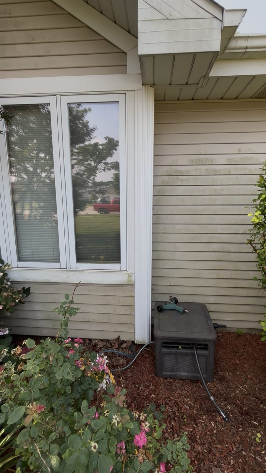 Before: Dirt and grime removed from siding